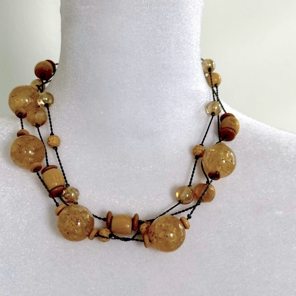 SALE Vintage Signed Dabby Reid 3 strand beaded necklace Various tan colors. 18”